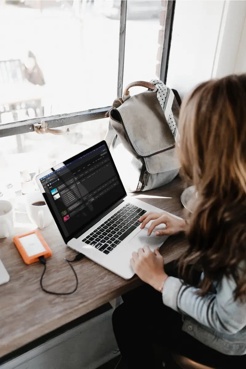 woman at laptop on alteon 
